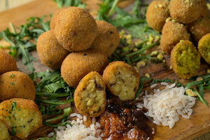 Illustrazione grafica con  arancini vegani mignon.Soluzioni vegane per ristoranti e take-away