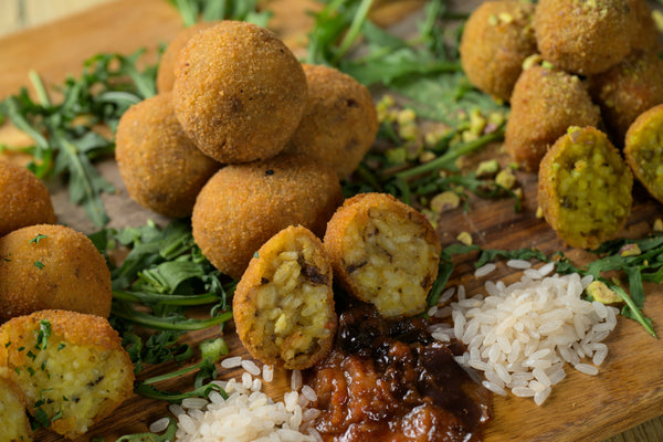 Illustrazione grafica con  arancini vegani mignon.Soluzioni vegane per ristoranti e take-away